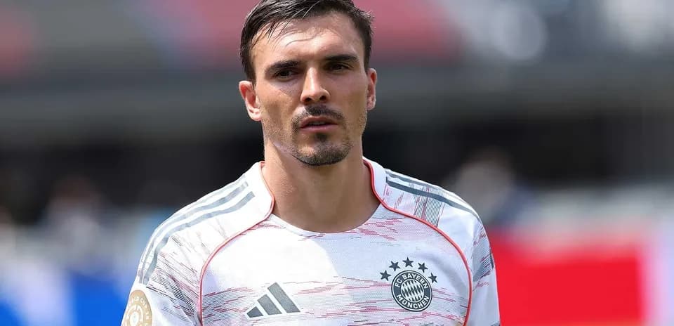 Player wearing Bayern Munich jersey on field