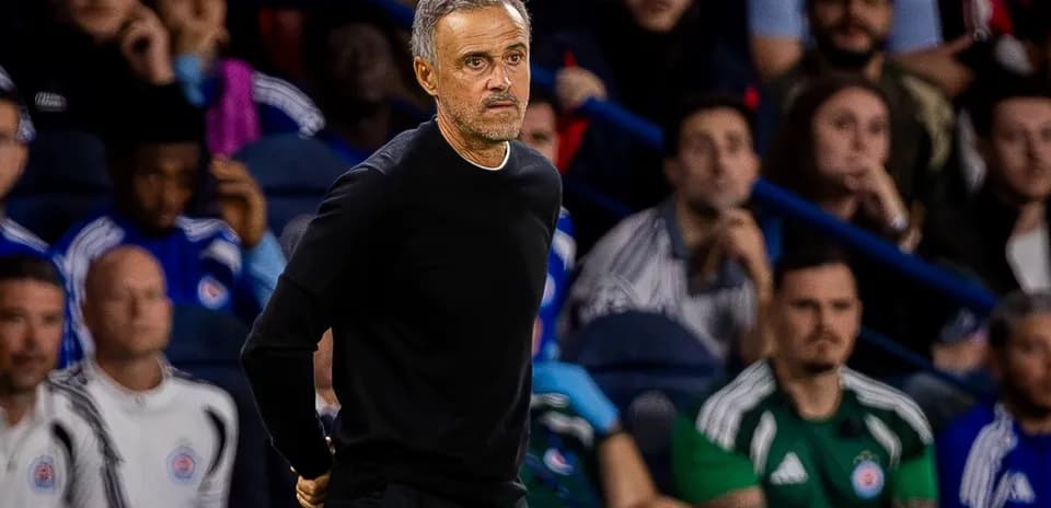 Coach observing the match from the sidelines