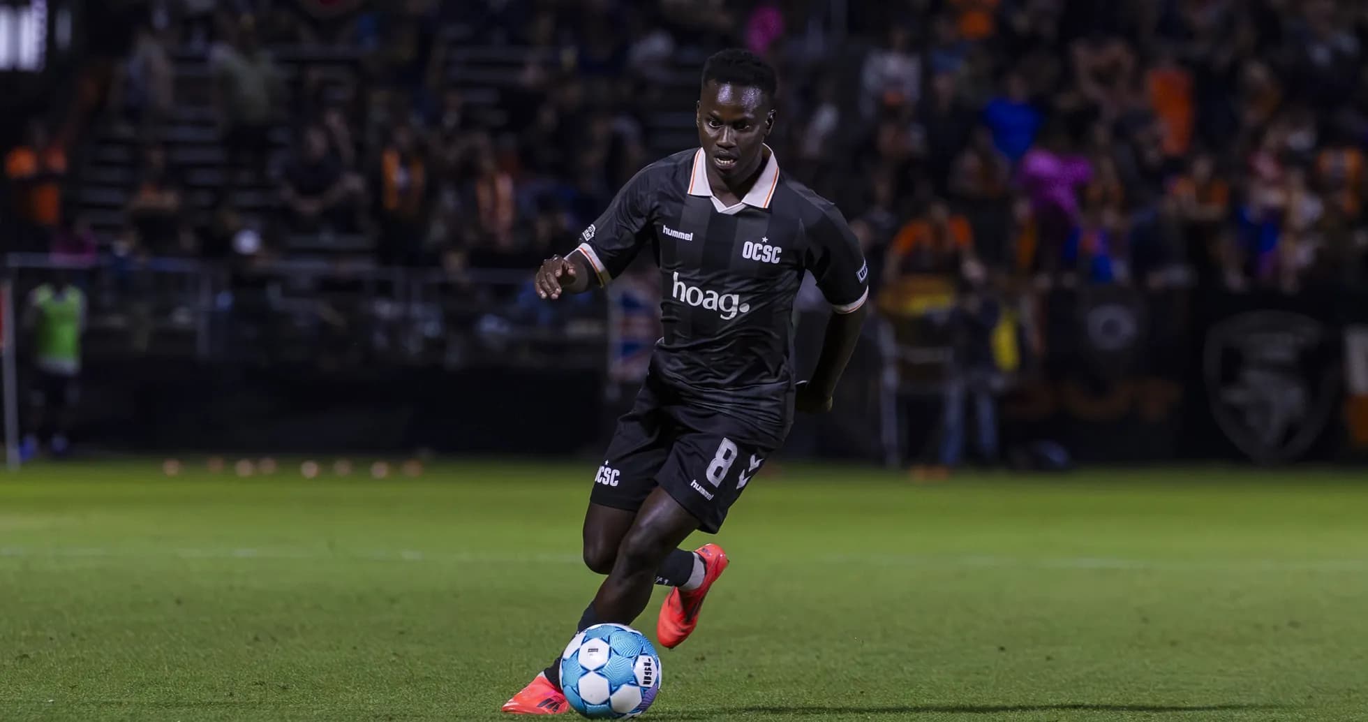 Player dribbling the ball during match