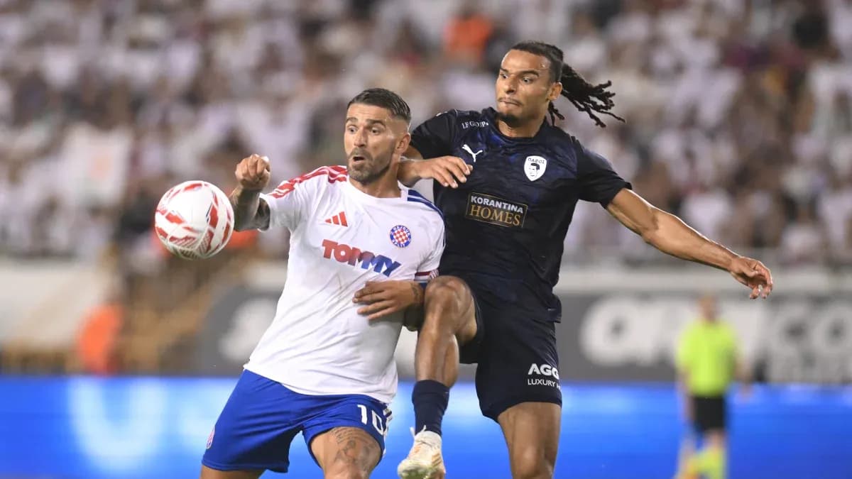 Players competing for the ball during match
