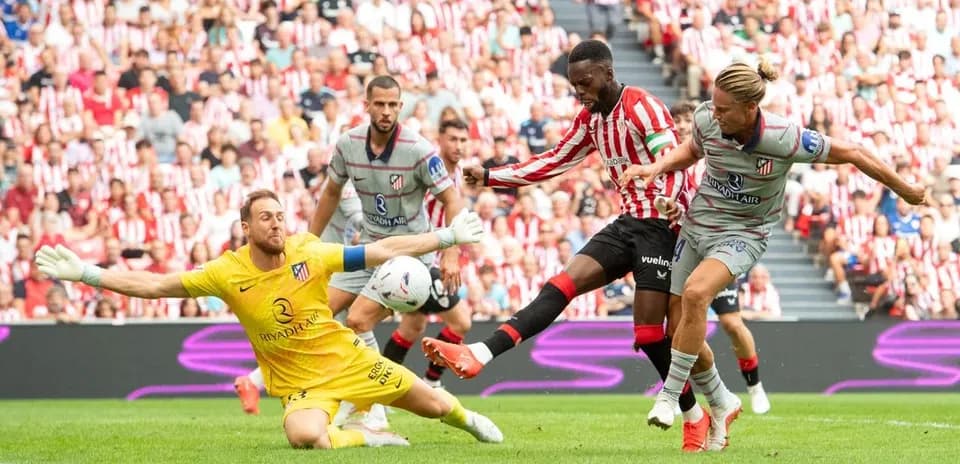 Athletic Club player shoots on goal against Atletico