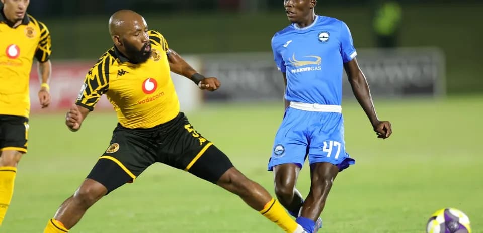 Players from Kaizer Chiefs and opponents competing for the ball