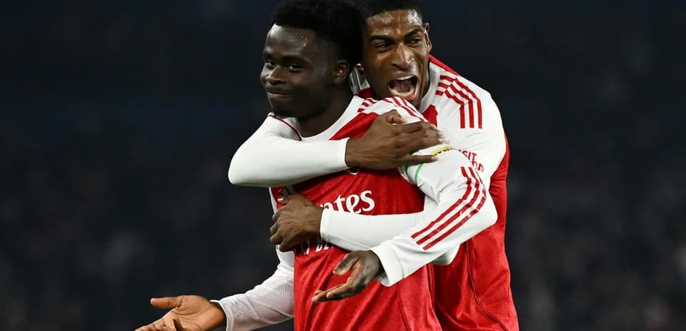 Arsenal players celebrating during Premier League match