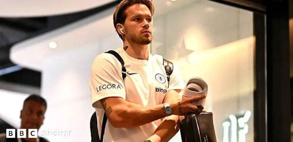 Player arriving at venue carrying sports equipment