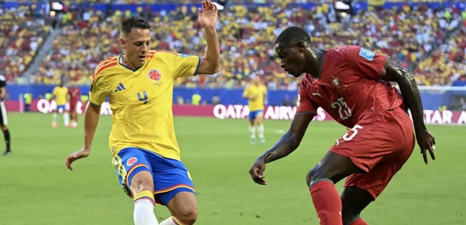 Colombian player challenging opponent during match