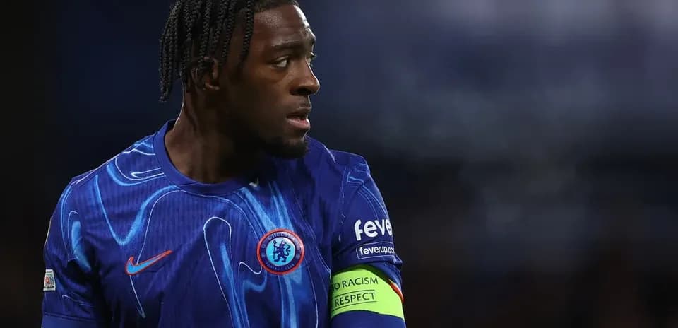 Player wearing Chelsea kit during match action
