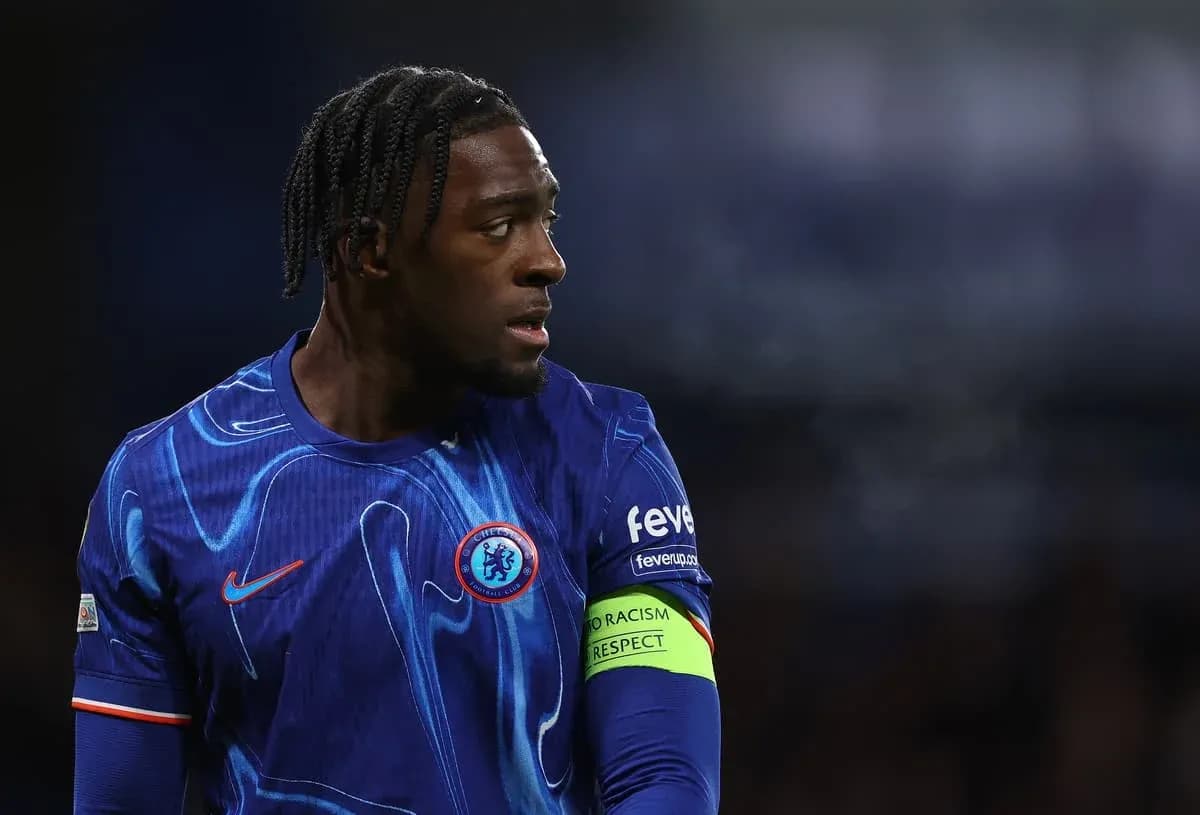 Player wearing Chelsea kit during match action