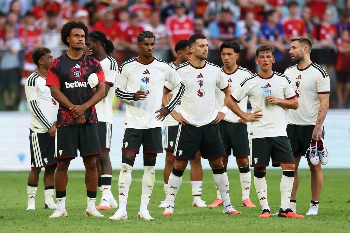 Football players standing together during match pause