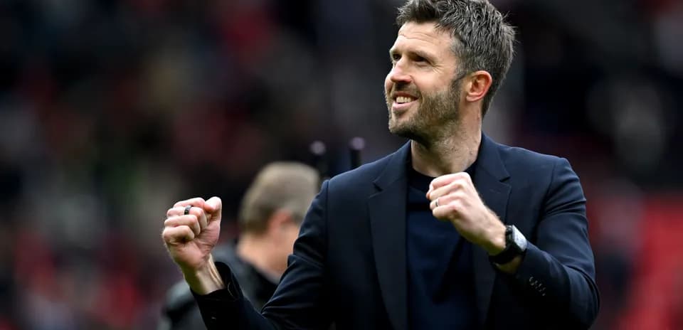 Coach celebrating a victory on the pitch