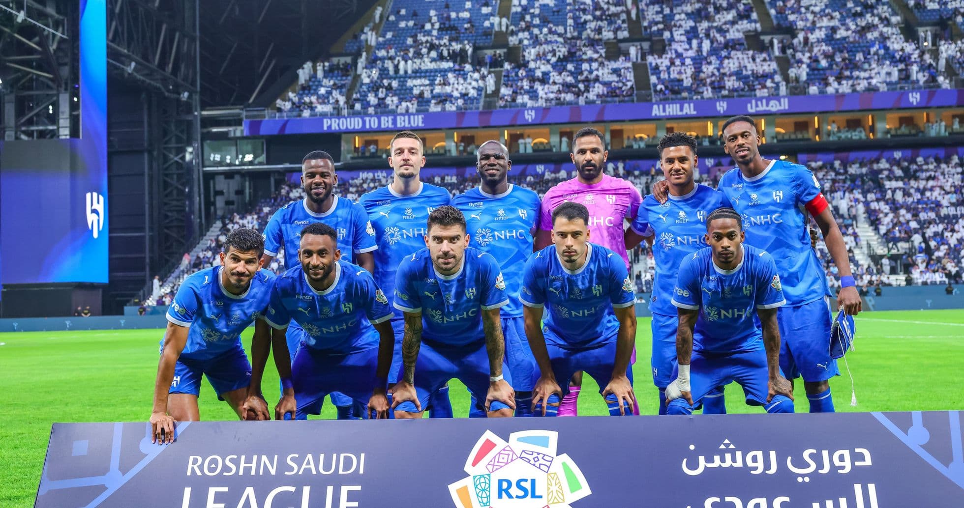 Al Hilal team posing before a match in stadium
