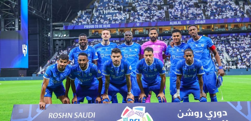 Al Hilal team posing before a match in stadium