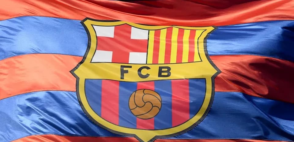 FC Barcelona crest on flag with blue and red stripes