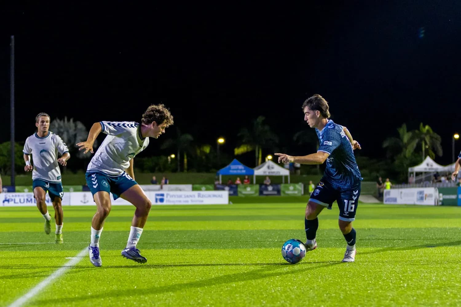 Players competing during Naples vs Sarasota match