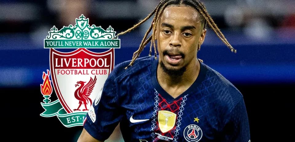 Player in PSG kit running towards the camera