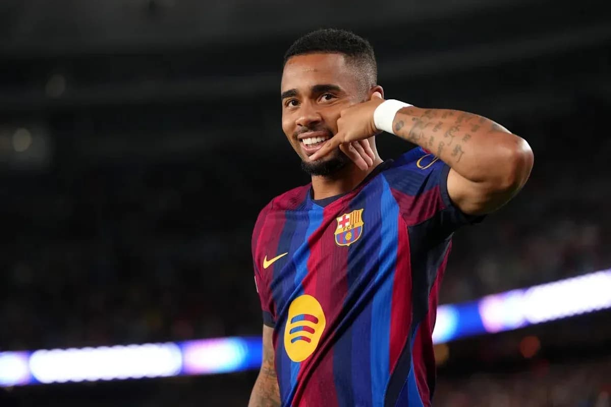 Player celebrating a goal with hand gesture