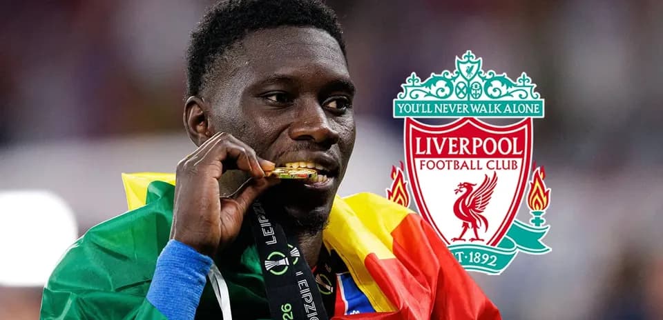 Player celebrating with medal and national flag