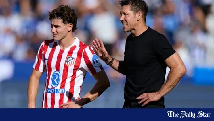 Atletico Madrid player and coach during match discussion