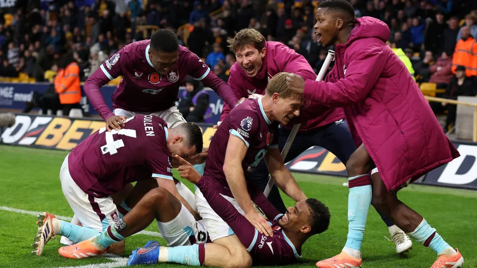 Burnley players celebrating a goal