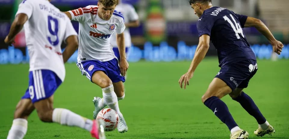 HNK Hajduk Split player dribbling past opponent