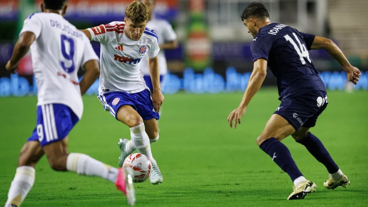 HNK Hajduk Split player dribbling past opponent