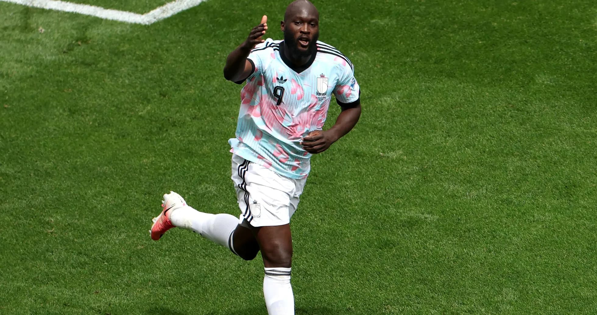 Player celebrating a goal on the pitch