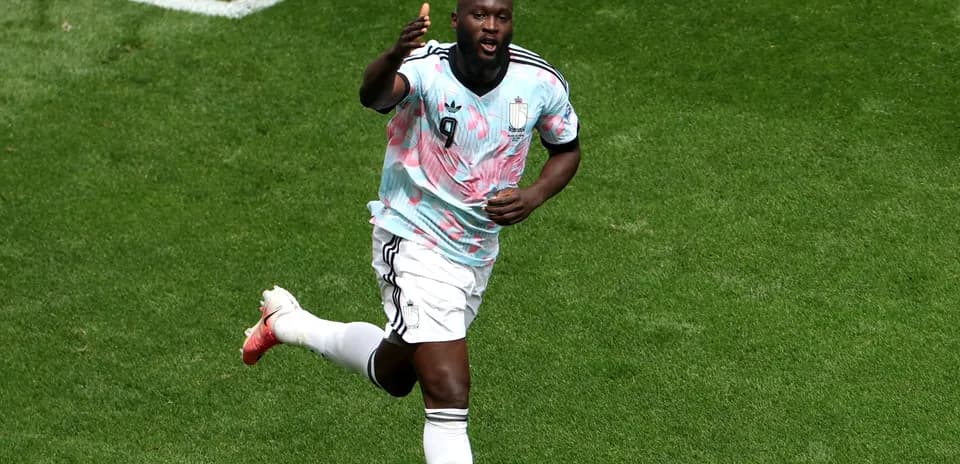 Player celebrating a goal on the pitch