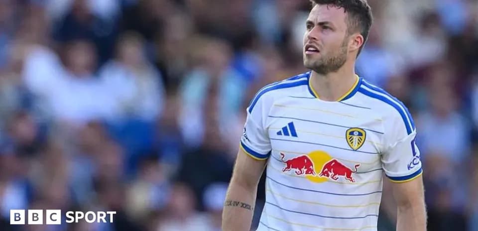 Leeds United player looking up during match