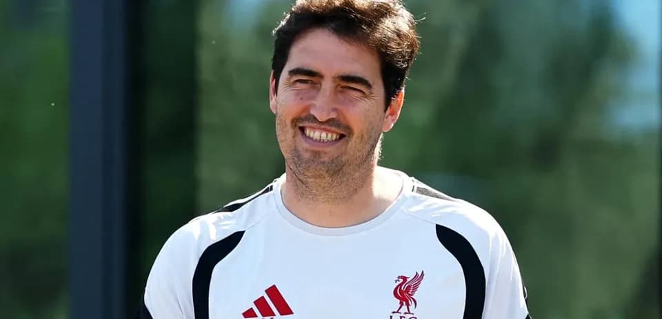 Coaching staff member smiling during training session