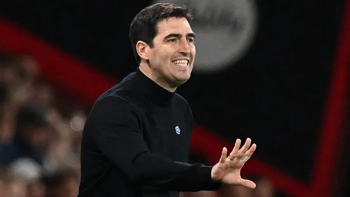Coach gesturing during a football match