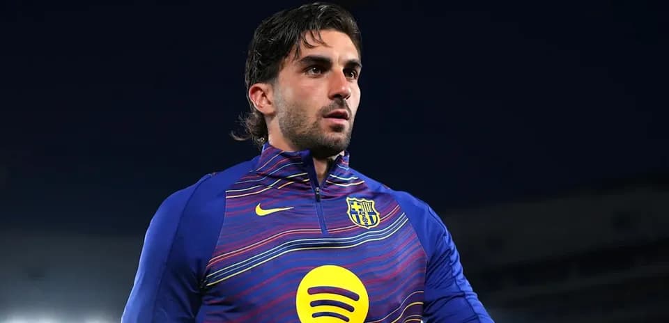 Football player wearing Barcelona training kit