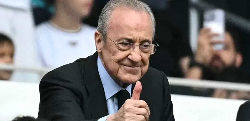 Man giving thumbs up in stadium seating