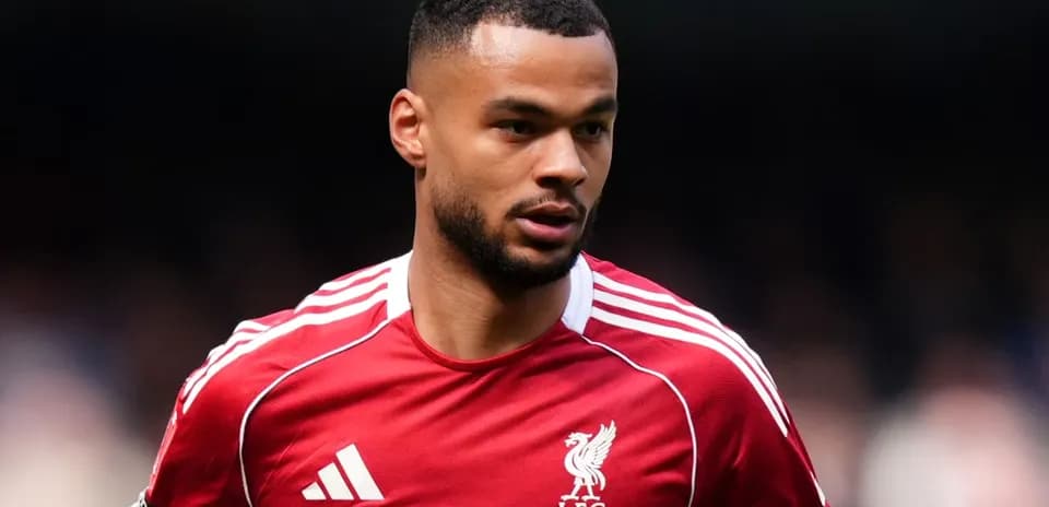 Player wearing Liverpool FC kit during match