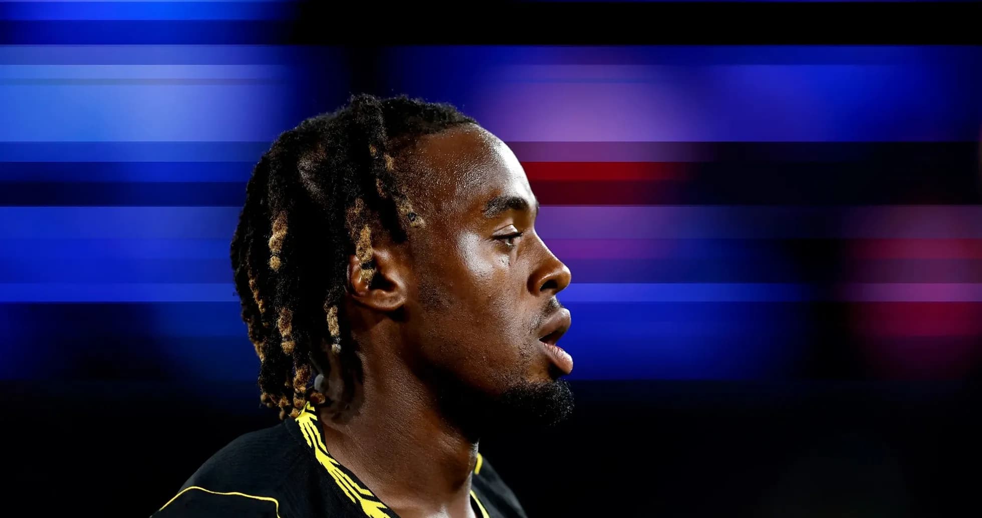 Athlete in profile with blurred background