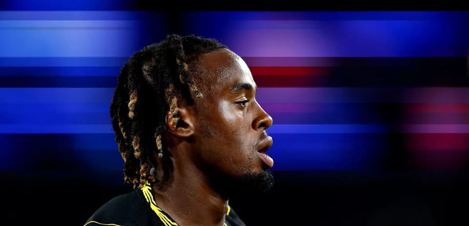 Athlete in profile with blurred background