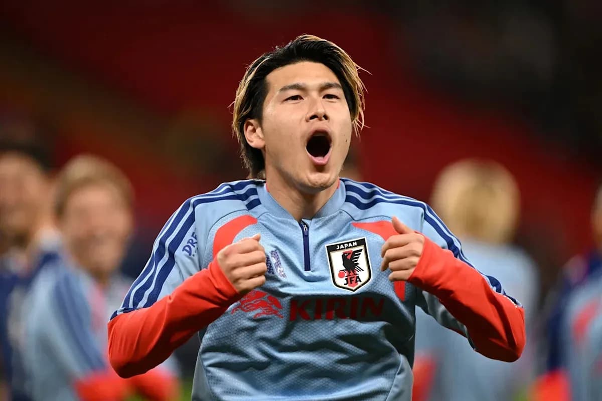 Player celebrating in Japan national team jersey