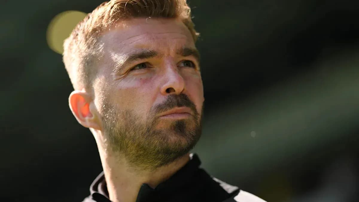 Close-up of a man with short hair and beard