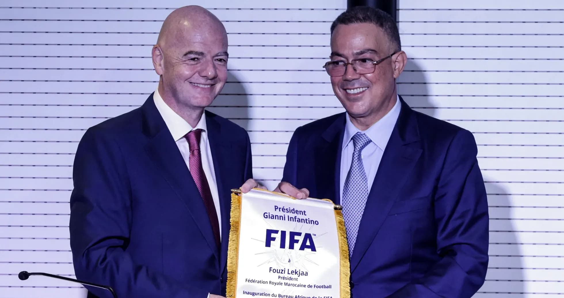 Gianni Infantino presenting FIFA plaque to Fouzi Lekjaa