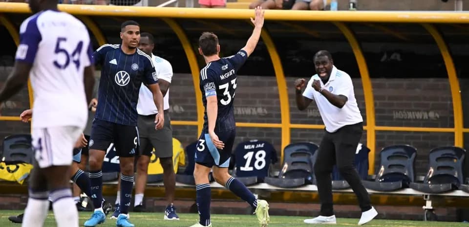 Players celebrating a goal during MLS Next Pro match