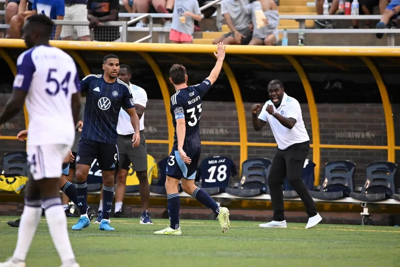 Players celebrating a goal during MLS Next Pro match