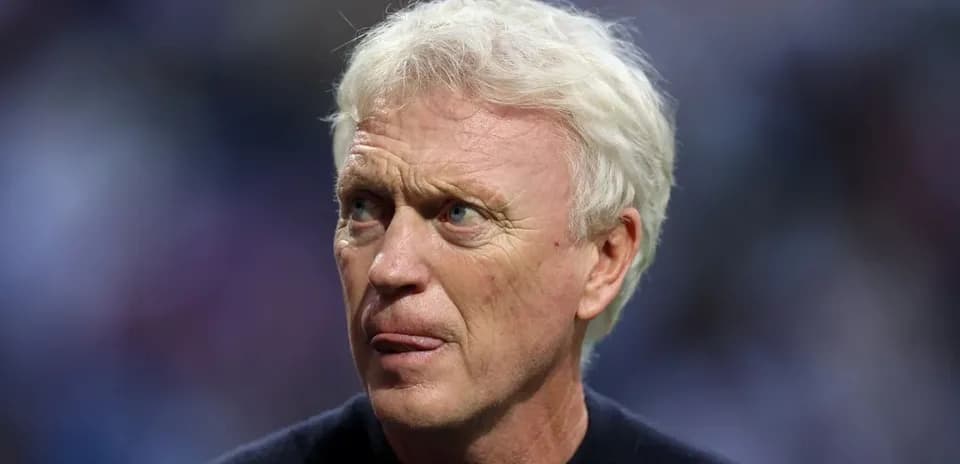 Coach looking thoughtful during match preparation