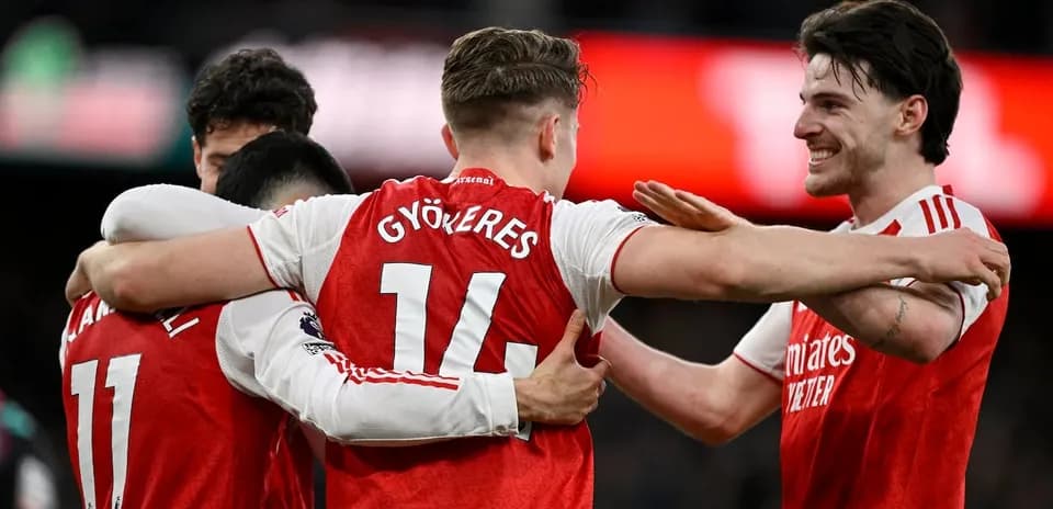 Arsenal players celebrating a goal