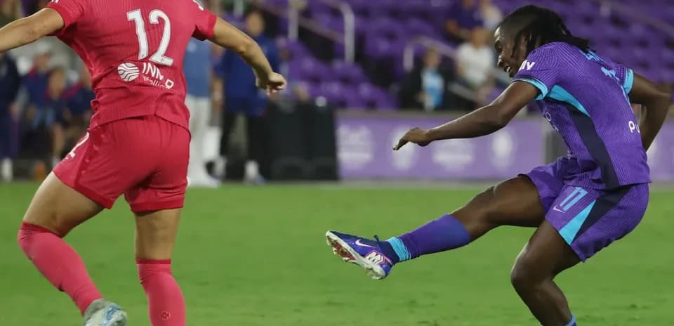 Two players competing during NWSL match