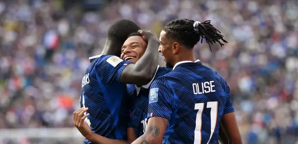 Players celebrating a goal during a match