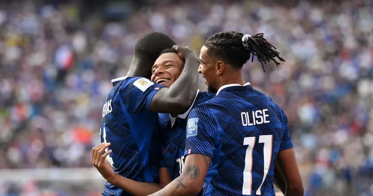 Players celebrating a goal during a match