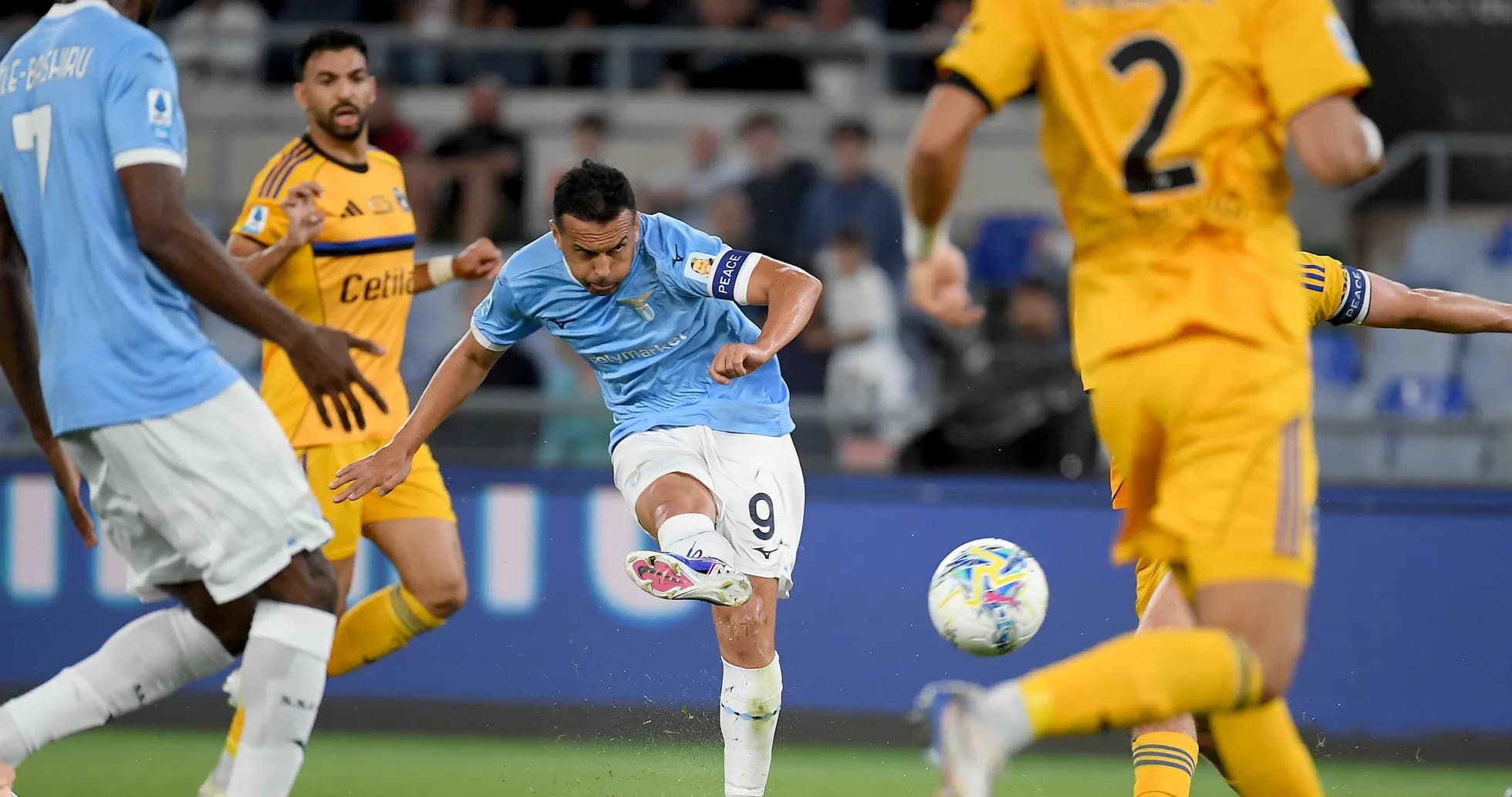 Lazio player striking the ball in match