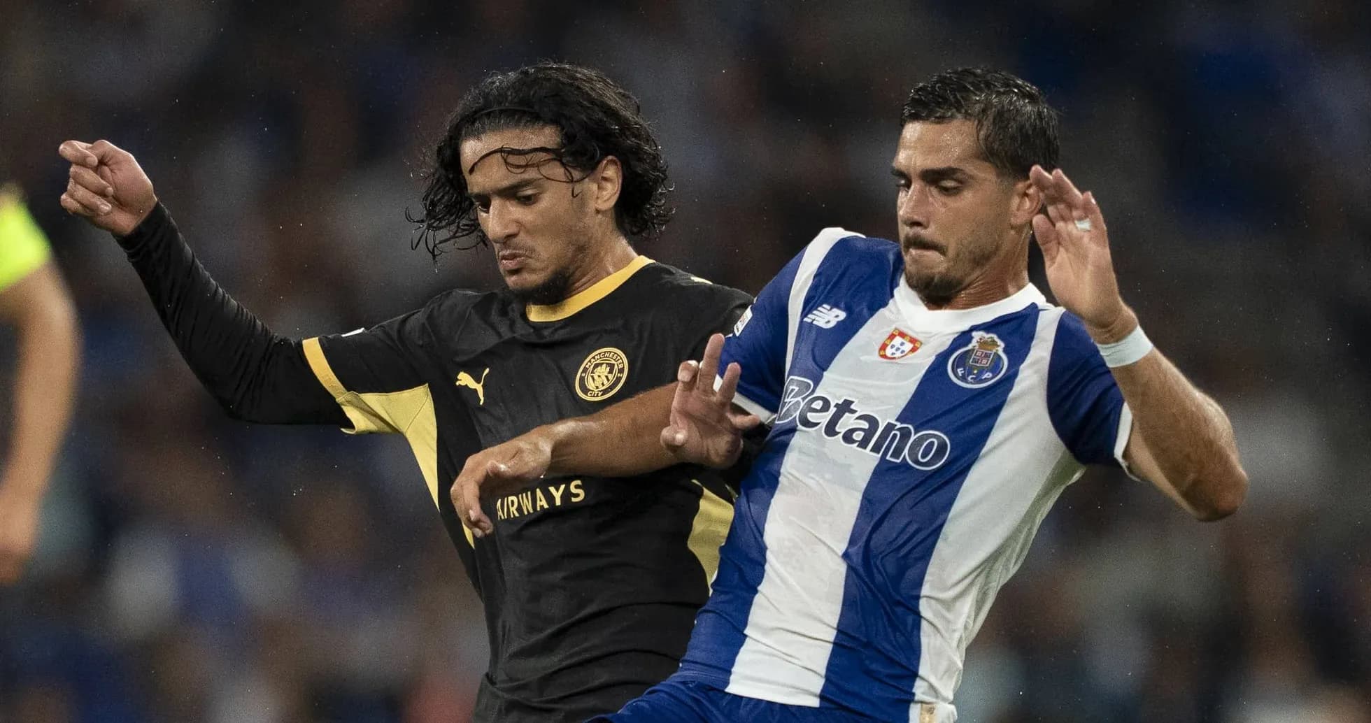 Two players contesting the ball during a match