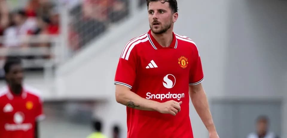 Player in red Manchester United kit on the field
