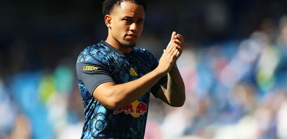 Player clapping while wearing Leeds United kit