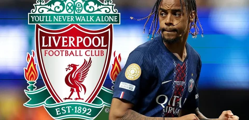 Player in PSG kit near Liverpool FC logo