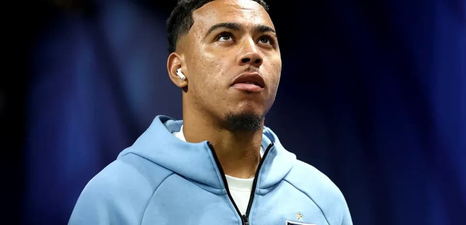 Player in England hoodie preparing for match
